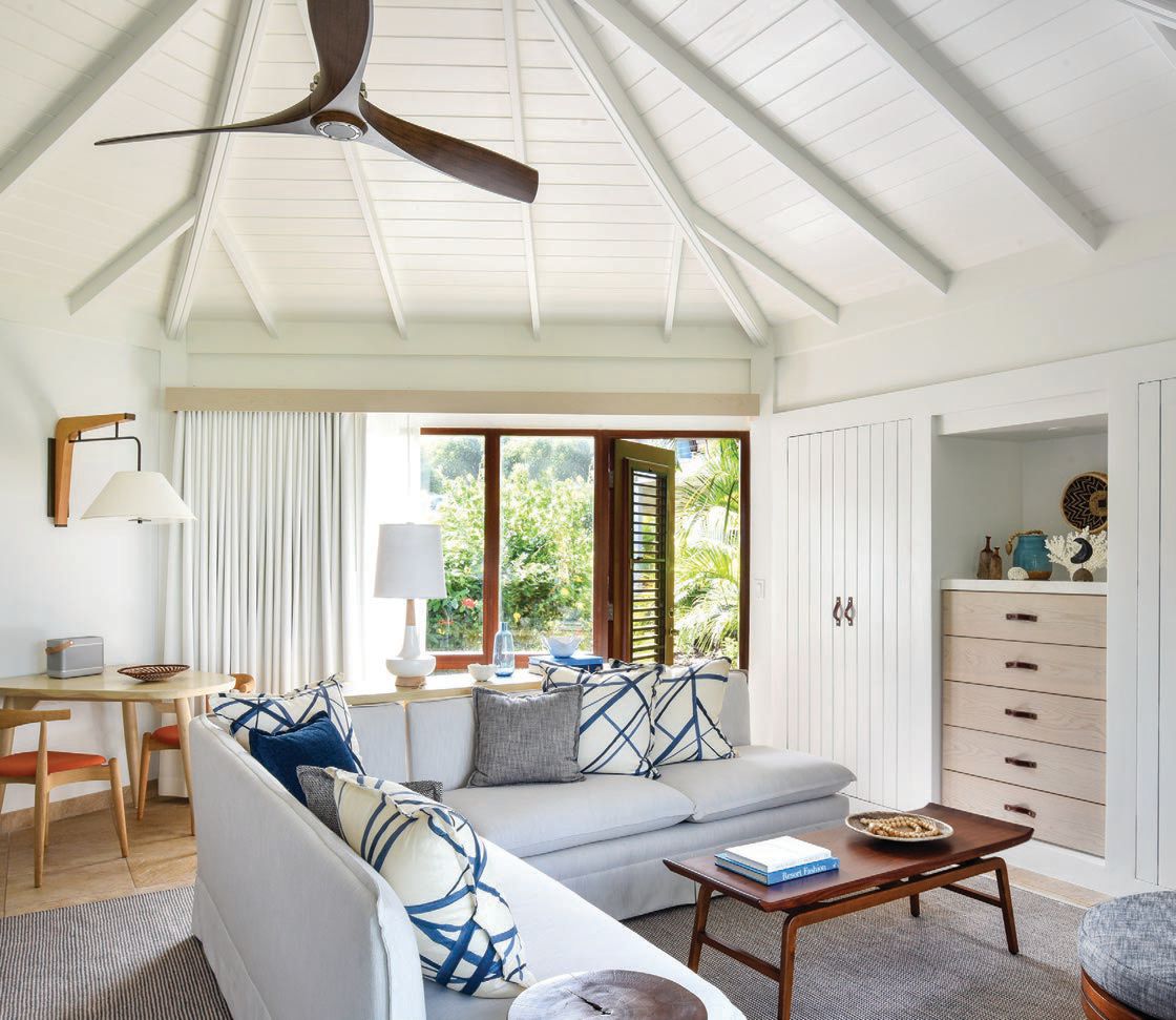 The spacious rooms boast midcentury modern style with a kiss of island chic COURTESY OF ROSEWOOD LITTLE DIX BAY