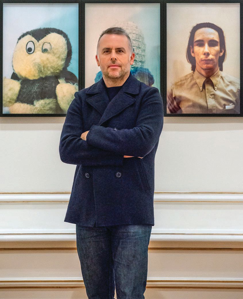 Douglas Fogle in front of a work by artist Mike Kelley PHOTO: BY PANOS KOKKINIAS