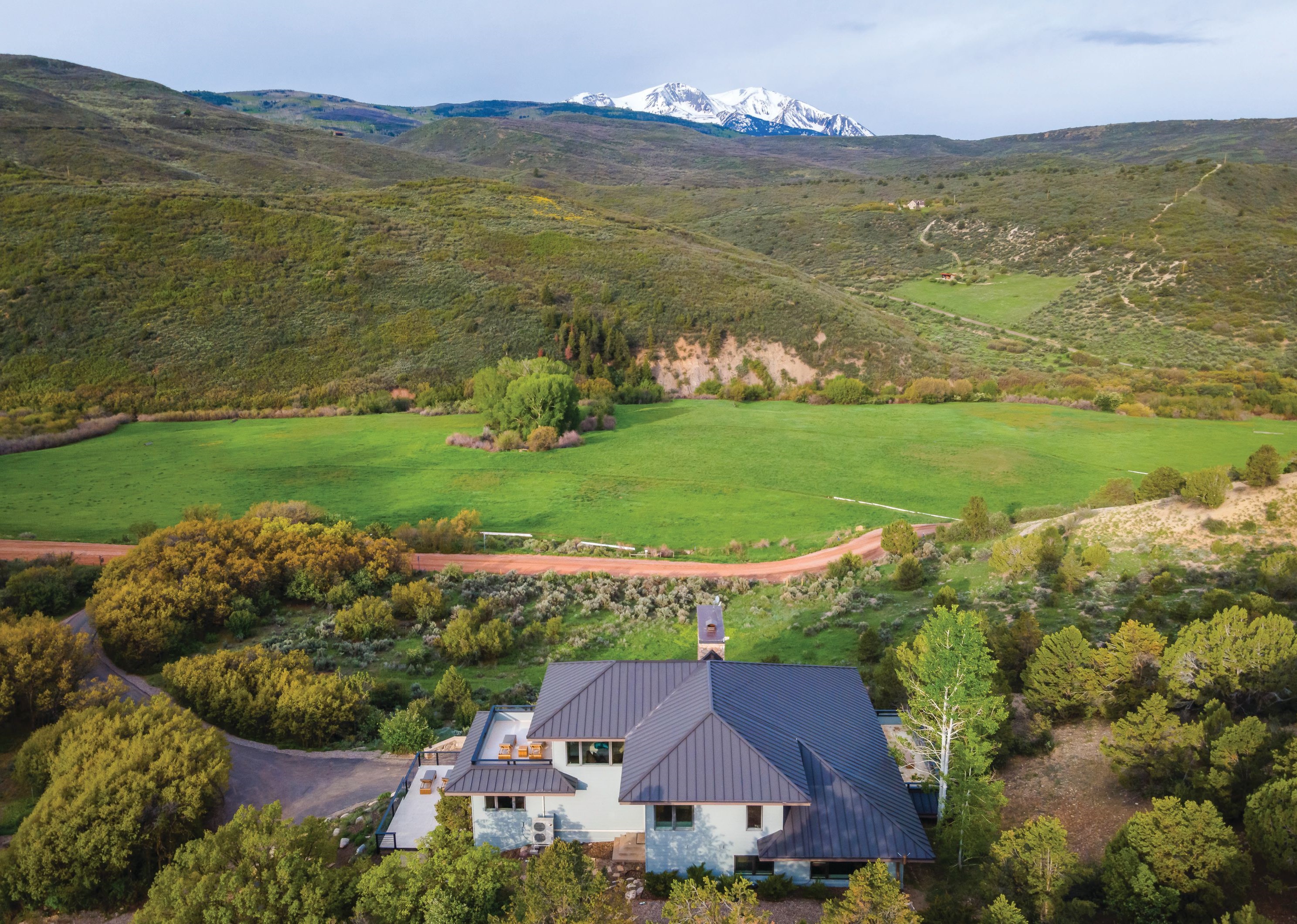 Featuring incredible views, the home is located in a peaceful valley. PHOTOGRAPHED BY SAM FERGUSON
