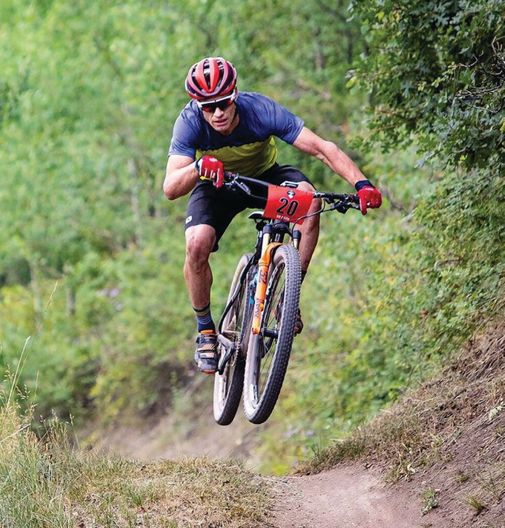 Riding in the Snowmass 50 mountain bike race. TETON PHOTO BY LINDEN MALLORY