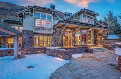 A grand exterior sets the tone for what visitors will see inside this home on Red Mountain PHOTO COURTESY OF: SLIFER SMITH & FRMAPTON REAL ESTATE
