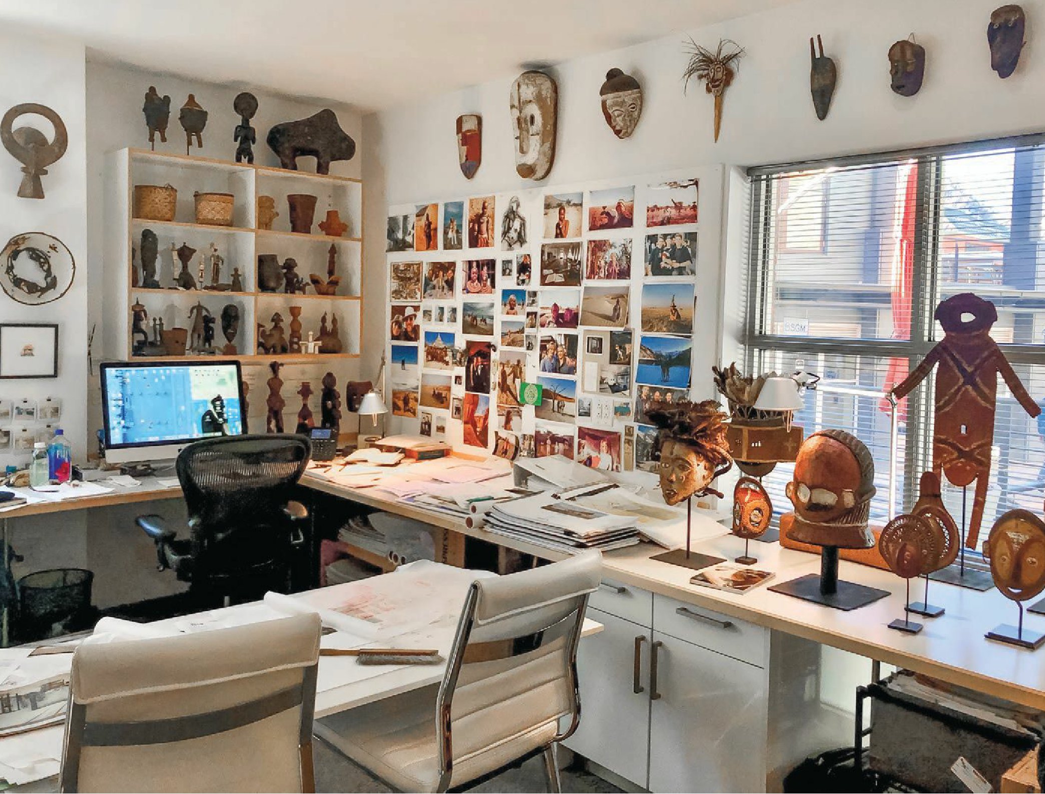 Lindenau’s personal office, filled with travel photos and artifacts PHOTO COURTESY OF SCOTT LINDENAU