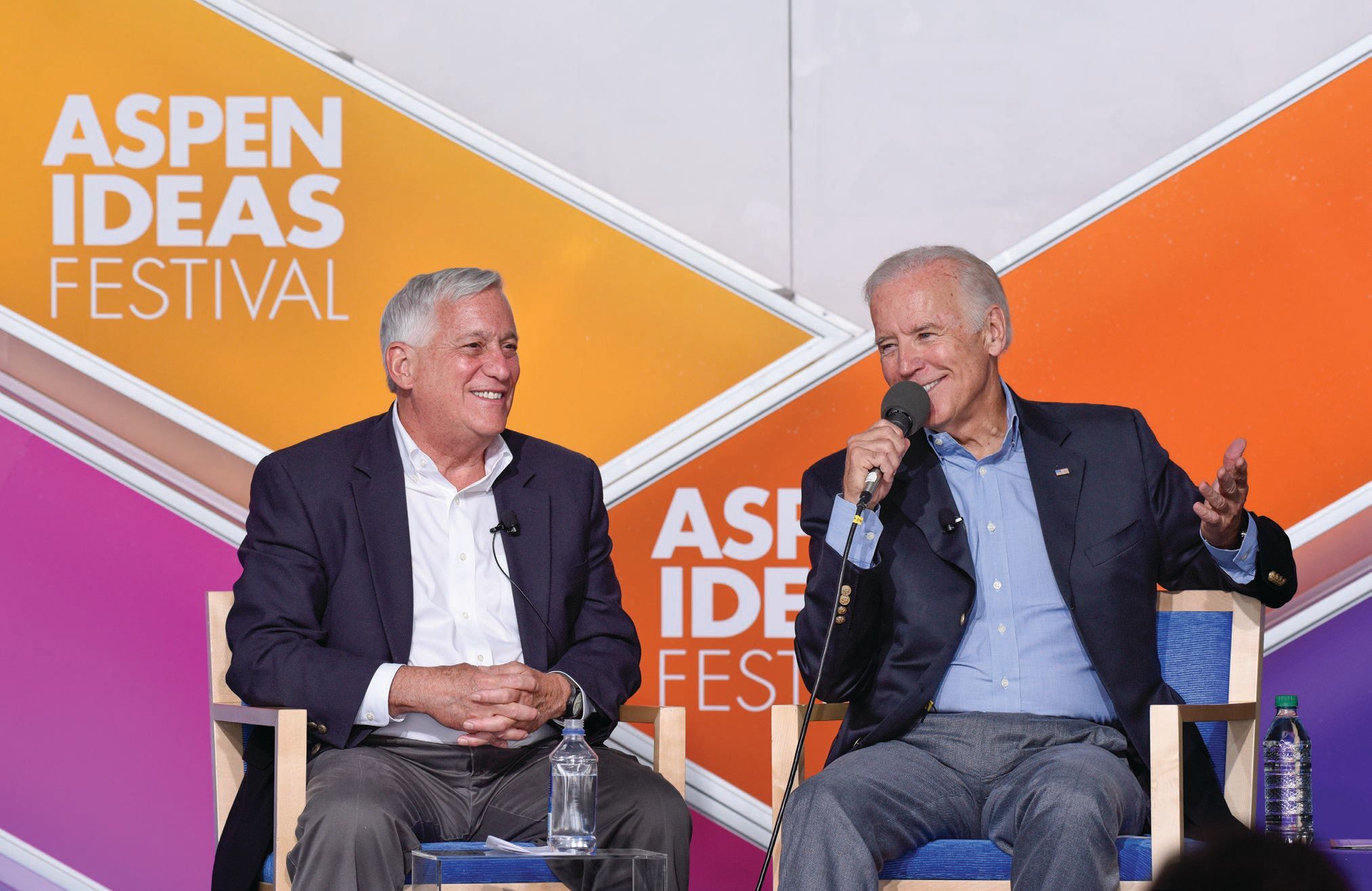 President Joe Biden speaks with Walter Isaacson during the 2016 Aspen Ideas Festival. Opposite: Isaacson and Bill Gates attend “ A Conversation with Bill Gates” on day 4 of Aspen Ideas Festival 2010 on July 8, 2010. PHOTO COURTESY OF THE ASPEN INSTITUTE